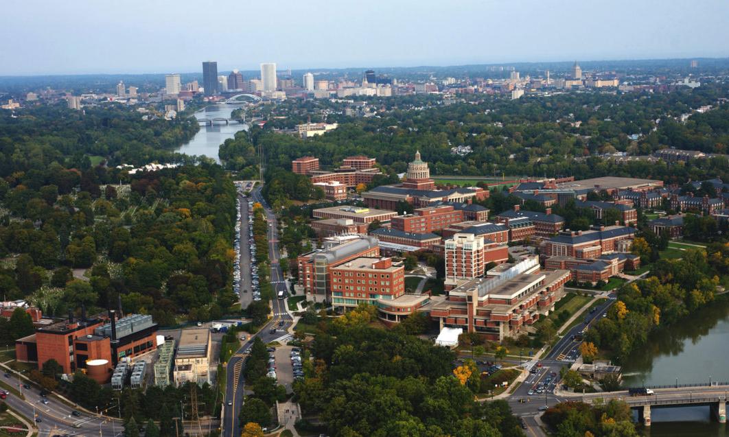Aerial view of the University of Rochester campus and the downtown Rochester skyline